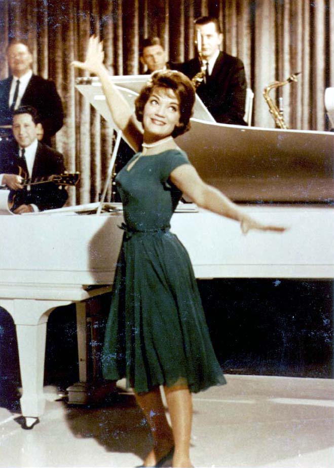 Connie in green Don Loper dress