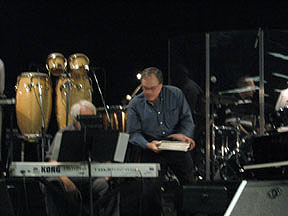 Doug Walters discusses music program with keyboard player