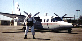 me in round parachute gear at Paso Robles airport, CA